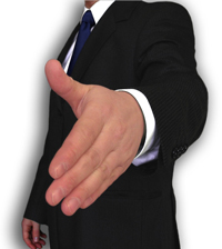 Man in a suit, holding out hand to shake